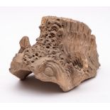 A large Chinese terracotta ridge tile: in the form of a dragon's head,
