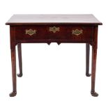 A George II oak lowboy, circa 1740,