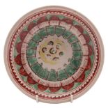 A Chinese Swatow ware deep plate: painted in iron-red,