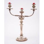 A plated twin branch candelabrum: with urn-shaped reeded sconces on swept reeded branches issuing