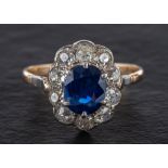 A 15ct gold and silver, cushion-cut sapphire and old-cut diamond cluster ring,