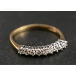 A 18ct gold and round, brilliant-cut diamond half-eternity ring,: total estimated diamond weight ca.