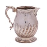 An Elizabeth II silver jug, London assay office, London, 2022: of ovoid form,