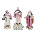A matched pair of Bow standing figures of an Abbot & Abbess together with a similar figure of an