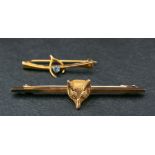 Two bar brooches,: a fox's head bar brooch, stamped '9CT', length ca. 5.