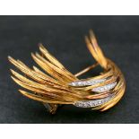 An 18ct gold and single-cut diamond brooch with sponsor mark by Garrad & Co in the form of a plume