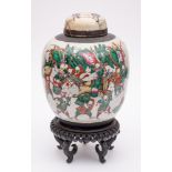 A Chinese 'crackle ware' jar and cover: of oviform decorated in colours with numerous warriors