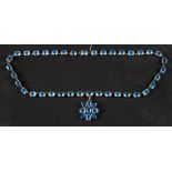 A 15ct gold, early 19th century, faceted light blue paste, necklace with a detachable,