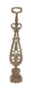 A brass door porter: of lyre-shaped outline,