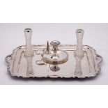A silver plated rectangular serving tray: with moulded edge and loop carrying handles, 51cm wide,