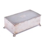 A George VI silver cigarette box, maker William Adams Ltd, Birmingham,