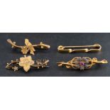 Four bar brooches,: including a 15ct gold and synthetic ruby floral brooch, length ca. 4.