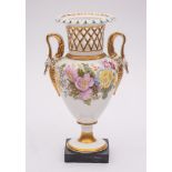 An early 19th century English porcelain two-handled vase: in Swansea style with pierced basketwork