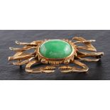 A mid-20th century, crab jade brooch,: stamped '14K', length ca. 4.5cm, total weight ca. 8.3gms.