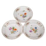A set of three large Meissen dishes: with Dulong pattern rims moulded with flowers and palmettes,
