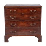 A George III mahogany and crossbanded chest of drawers, circa 1765,