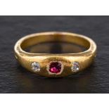 A ruby and old-cut diamond three stone ring,: total estimated diamond weight ca. 0.