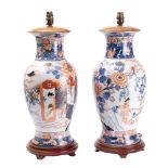 A pair of modern Chinese Imari style vases: of ovoid form,