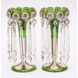 A pair of Bohemian green and white overlay glass lustres: each with serrated rim decorated with ten