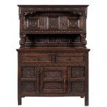 An oak court cupboard in 17th century style, late 19th century,