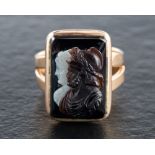 A 15ct gold, 19th century, carved sardonyx cameo ring,: depicting Mars and Venus in profile,