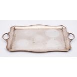 A silver plated serving tray: of rectangular outline,