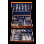 A plated part flatware service: includes twelve table knives, eleven dessert knives,