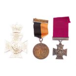 A replica Victoria Cross: a replica Eire General Service Medal and a replica The Kings Royal Rifle