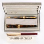A Parker 51 Custom fountain pen: maroon and gold,