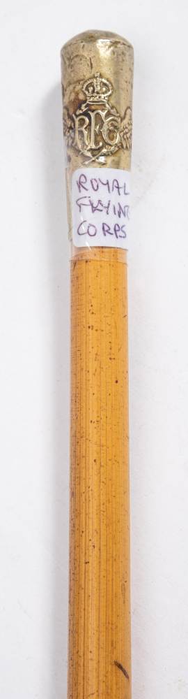 A Royal Flying Corps swagger stick: the plated pommel with Kings crown on bamboo shaft, 68.5cm long.