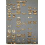 A collection of shoulder titles, Kings Regiment and others.