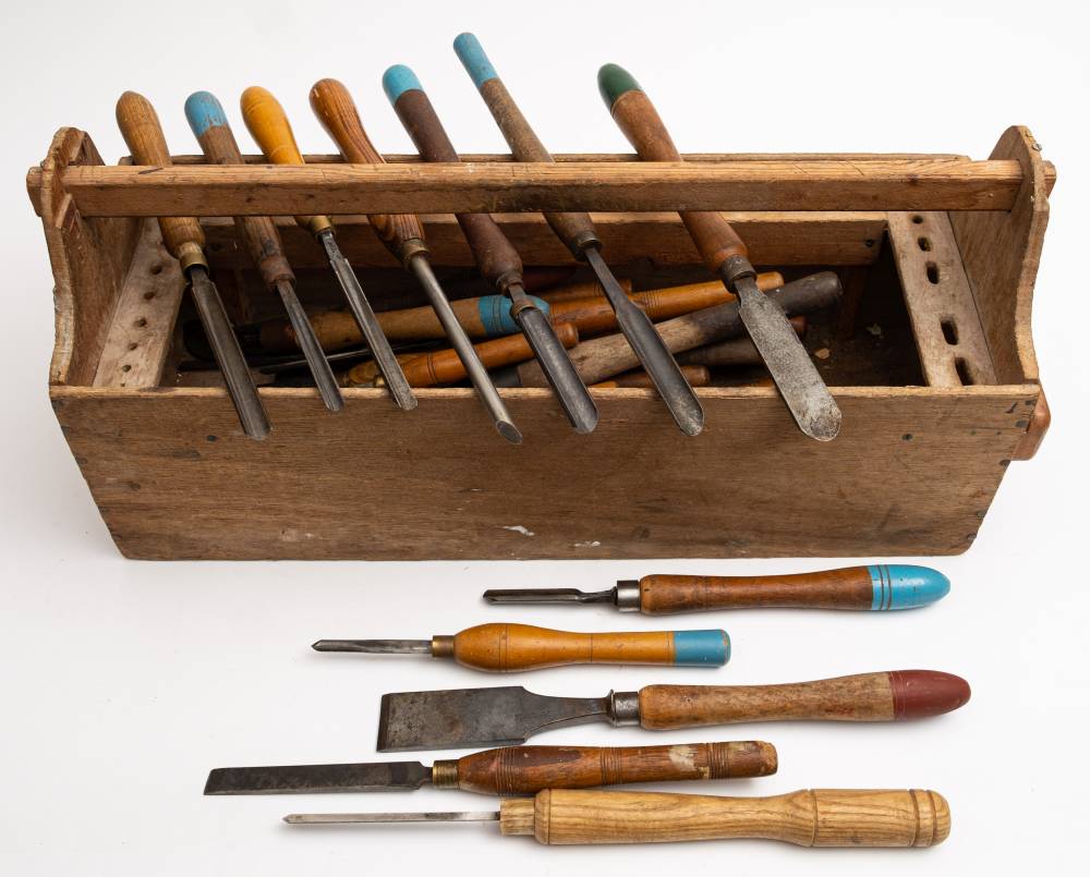 A collection of woodturning chisels: various sizes and makers including Mitchell & Co,