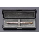 A Parker silver fountain pen in Cisele silver with 18k gold nib: cased.
