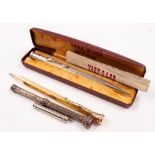 A Victorian silver propelling pencil: together with a gold plated propelling pencil and a