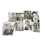 A group of twelve autographed publicity photos: Elizabeth Taylor Burton, Richard Burton,