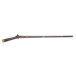 A late 19th century Indo-Persian flintlock musket: the 44 1/2 inch octagonal Damascus barrel with
