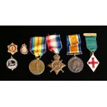 A WWI trio to '94977 Spr., A.M. Bruce R.E': together with four other badges.
