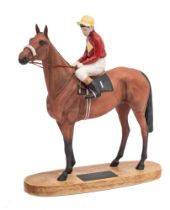 A Beswick equestrian group: Red Rum with Brian Fletcher up, on wooden base.