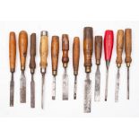 A group of twelve various chisels: various sizes and makers including Marples & Son,