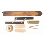 A 19th century miniature brass folding rule: unsigned, together with one other brass folding gauge,