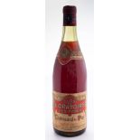 A bottle of Chateau Neuf-du-Papes Clos de L'oratoire des Papes 1969 ( low neck)