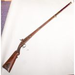 A 19th century Indian percussion cap rifle: the quadruple banded barrel with cannon barrel muzzle
