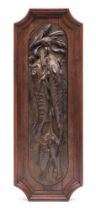 A cast iron wall relief of a brace of sturgeon, late 19th century,: with three smaller fish,