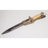 A reproduction Luftwaffe dagger in associated scabbard with leather frog: