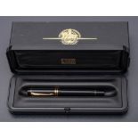 A Parker Duofold fountain pen: with 18k gold nib and black lacquer finish, cased.
