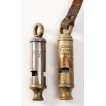 Two WWI period whistles: one by J Hudson& Co, Birmingham the other by A DeCourcy & Co,