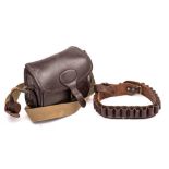 A brown leather cartridge bag and a brown leather cartridge belt: (2)