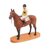 A Beswick equestrian group: Arkle with Pat Taaffe up, on wooden base, [missing leather reins].