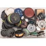 Shakespeare, Daiwa and others: a collection of various fly reels and spools in associated cases.