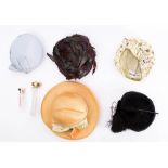 A small collection of mid to late 20th century lady's hats: including a floral decorated hat by
